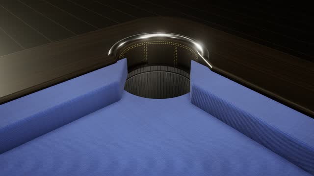 A corner pocket close up: woven cloth, leather and chrome